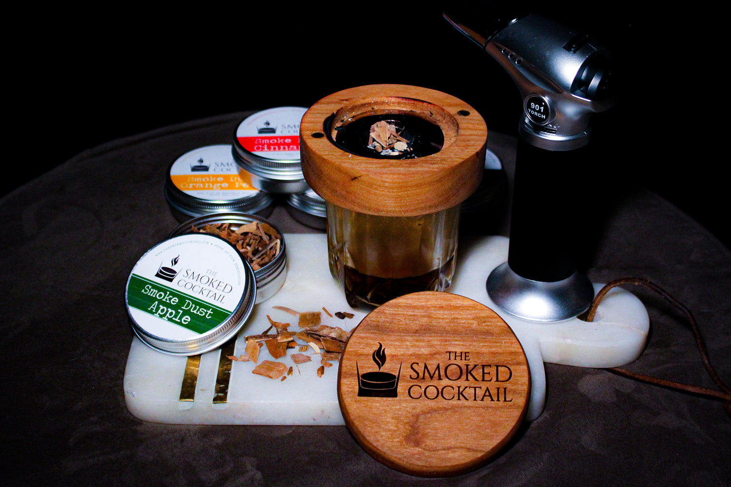 The Smoked Cocktail's cocktail smoker kit is a must-have for cocktail lovers everywhere. With our top-quality American Cherry smoker, smoke dusts, and torch, you'll be able to create the most delicious smoked whiskey drinks that will wow your friends and family.